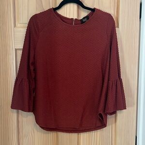 Rust brown colored raised dot top.